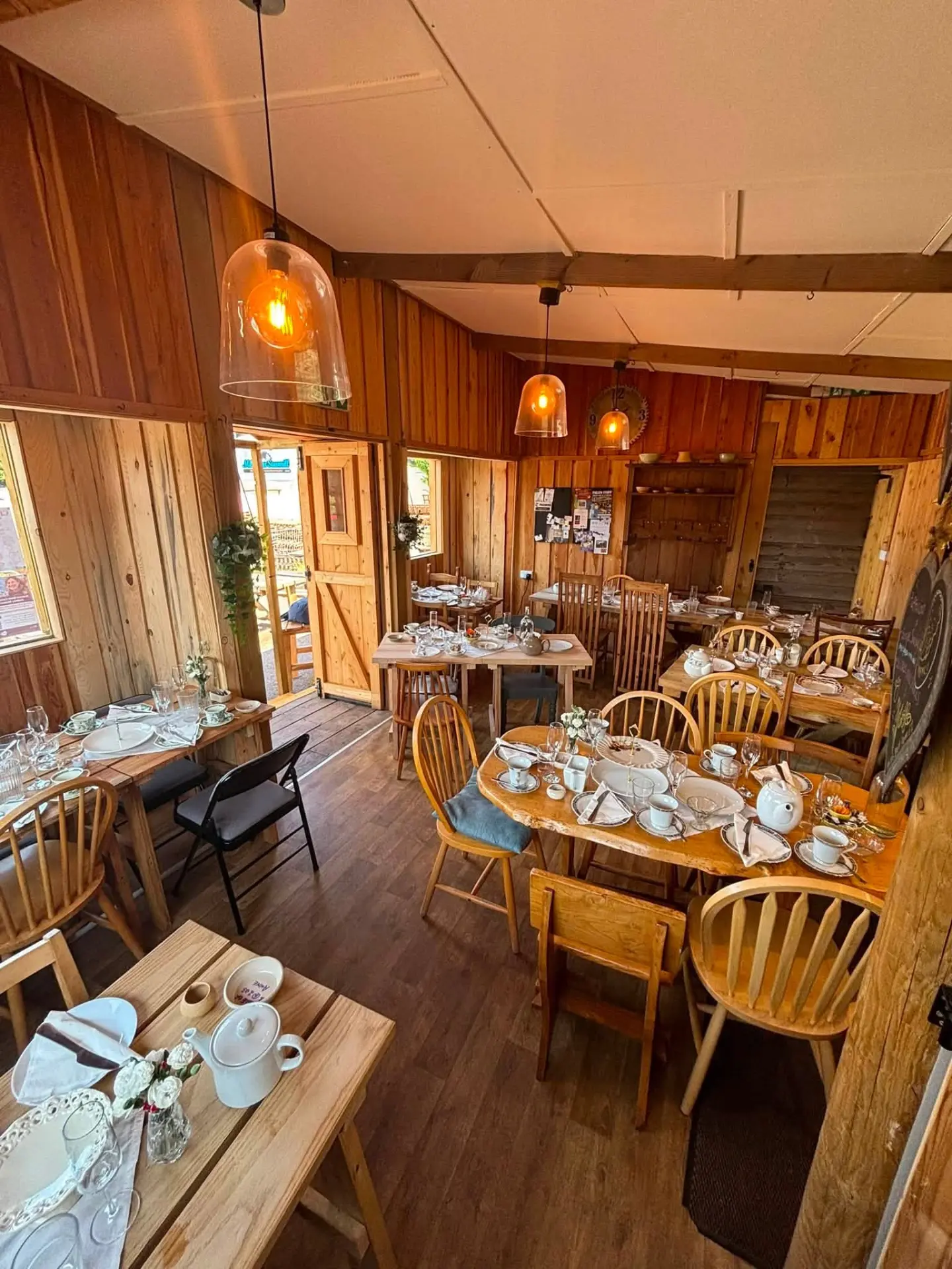 The warm timber dining room at The Coffee Mill