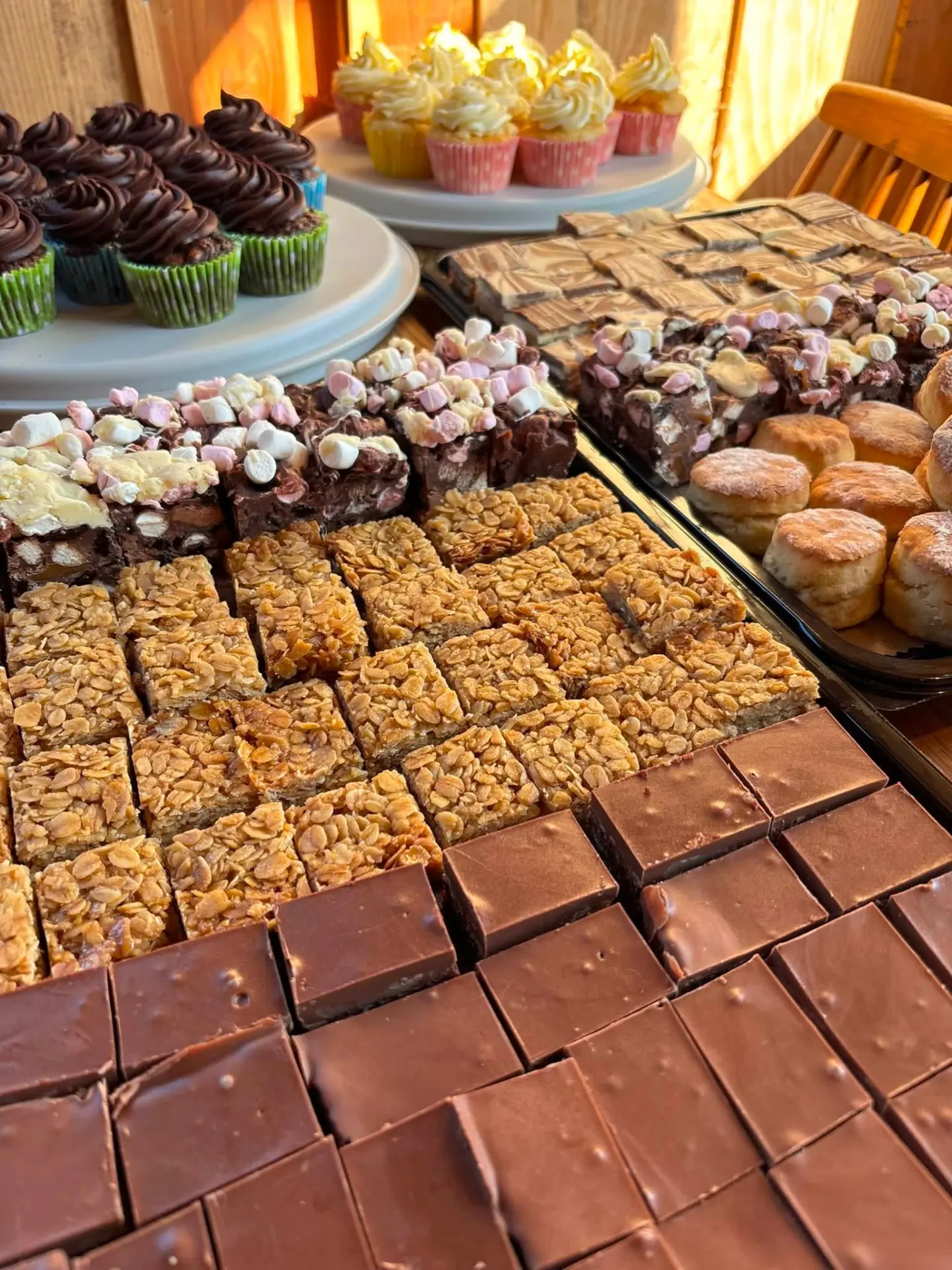A generous selection of homemade traybakes and cupcakes